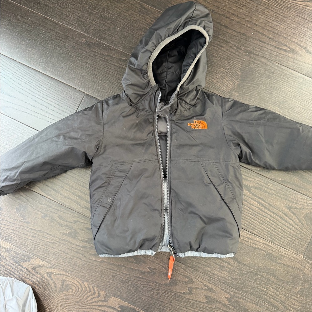 The North Face Black Jacket with Orange Logo Hooded Puffer